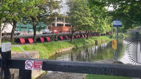 New tents lined the banks of Dublin's Grand Canal on Friday morning