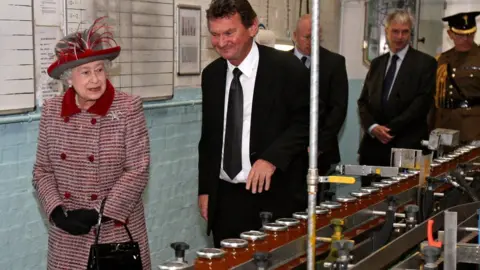 Getty Images Queen Elizabeth II inside the jam factory