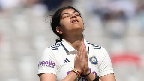 India batter Yastika Bhatia celebrates her century during day three of the 1st Women's Rothesay Test Match between England and India at Lord's Cricket Ground on July 12, 2026 in London, England.
