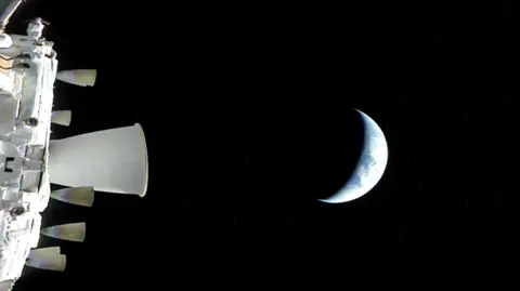 NASA The Earth in crescent as seen from Artemis