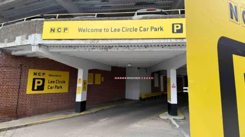 BBC Picture shows an empty entrance to Lee Circle Car Park with NCP signage