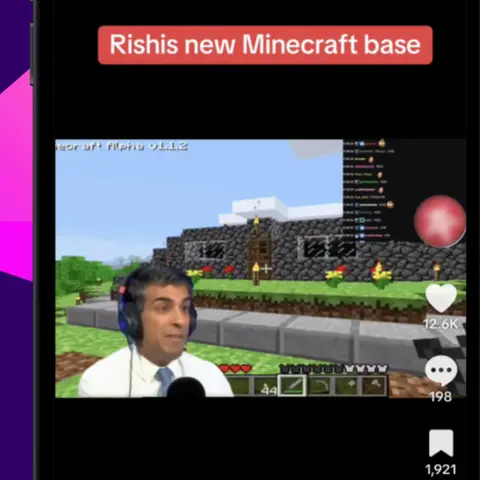 A graphic of a phone showing a TikTok post, purporting to be a live-stream of Rishi Sunak wearing headphones with a background showing a Minecraft game he is supposedly playing
