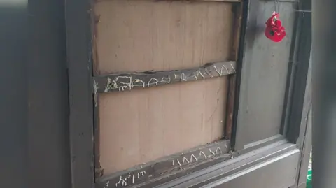 Kent Police The empty cabinet after the memorial plaques were stolen in Chatham.