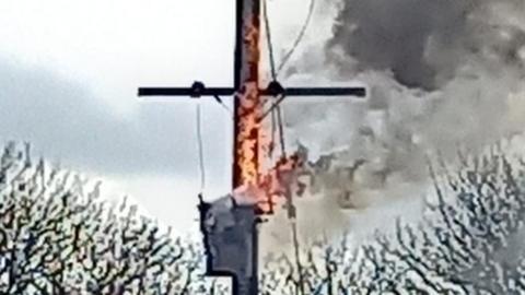 Power transformer pole on fire