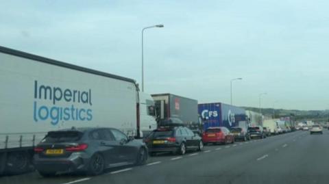 Cars and lorries queueing for the M20 slip road