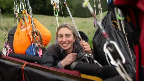 Johnny Green/PA Wire Adventurer Alicia Hempleman-Adams is smiling as she touches down in a field in Luxembourg in a hydrogen gas balloon.