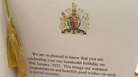 Luke Francis The message inside the card which has the words 'We are so pleased to know that you are celebrating your one hundredth birthday on 19th January, 2025. This brings our warmest congratulations and heartfelt good wishes on such a special occasions.'