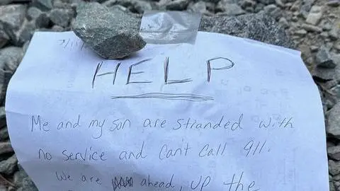 A picture of the note left by the mother who was lost in the forest with her nine-year-old son