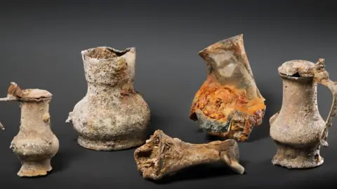 HISTORIC ENGLAND/CULTURAL HERITAGE AGENCY Collection of the pewter jugs found in the wreck of the Rooswijk