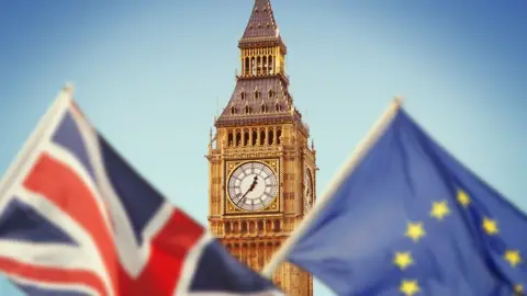 Getty Images The Union Jack flag and the EU flag in front of Big Ben