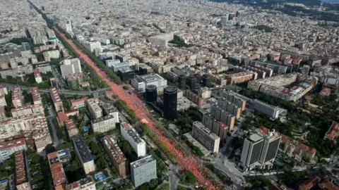 Reuters A line of red shirts in central Barcelona