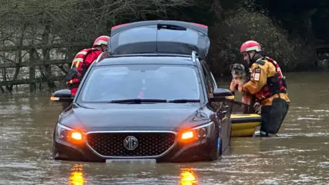 Essex County Fire and Rescue Service Car stranded in flood water