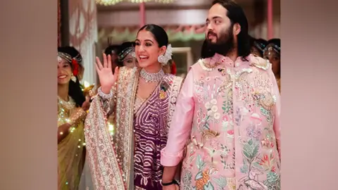 ANI Anant Ambani and his wife Radhika Merchant leave the ceremony in Mumbai