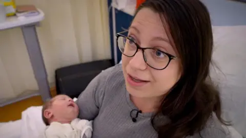 BBC Dominika Nanus and her one-day-old daughter Emilia, who is part of the screening programme