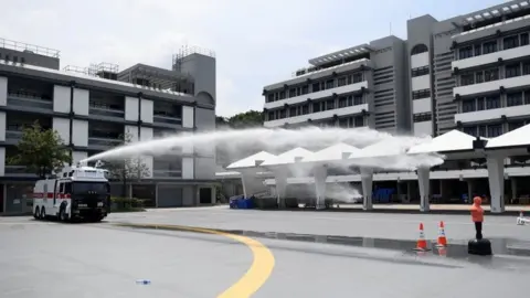 AFP Hong Kong Police demonstrate their new water cannon equipped vehicle at the Police Tactical Unit compound in Hong Kong