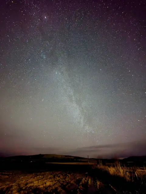 Pete Walls Long exposure image of stars and the Milky Way at night above Glen Esk