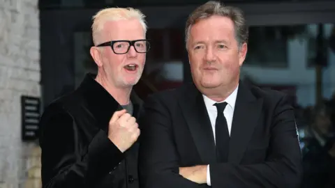 Getty Images Chris Evans and Piers Morgan