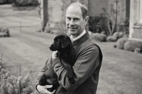 PA Media Prince Edward with puppy