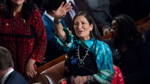 Getty Images Deb Haaland waves