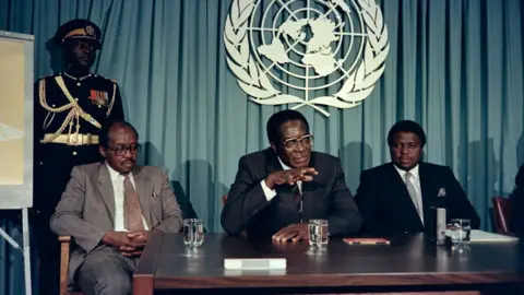 Getty Images Mugabe speaking to the press in 1998 about African prize for leadership he would go on to recieve