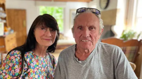 BBC Older couple (man and woman) in a kitchen