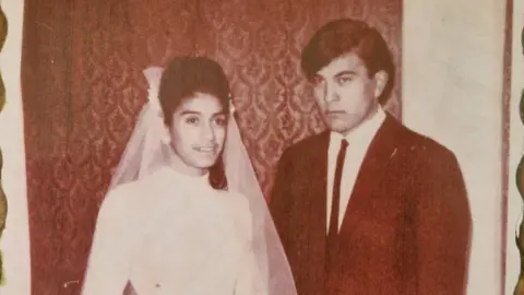 Courtesy of Mario Bracamonte Wedding photo showing Mario and Titi Bracamonte