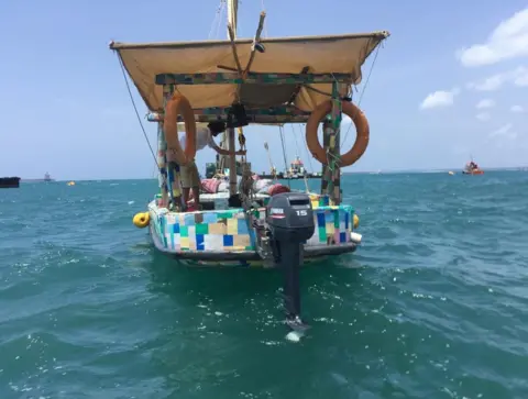 Munira Hussein/BBC The Flipflopi Dhow seen from the rear