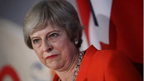 Getty Images Theresa May speaking after Salzburg summit