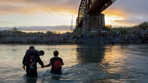 Getty Images People crossing into Texas