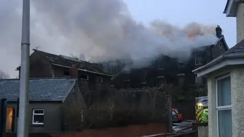 Carley Tyler Millard‏ Fire at Old Workhouse