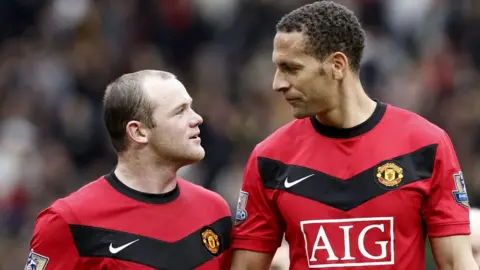 PA Media Wayne Rooney and Rio Ferdinand