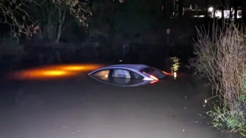Essex Police Car stuck in deep water in Essex