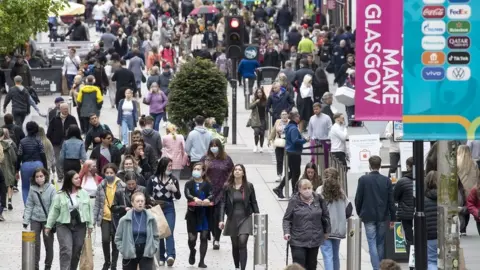 PA Media Glasgow street shoppers