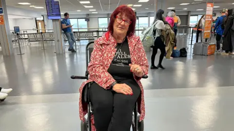 BBC A women sitting in a wheelchair