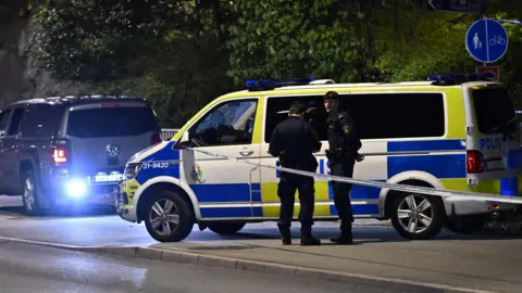 Swedish police outside the Israeli embassy in October 2024 after a suspected shooting