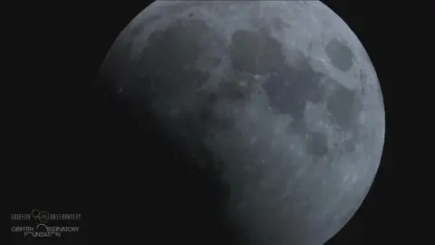 The moon seen partially obscured by the eclipse 