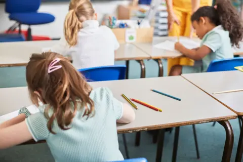 Children at a desk 