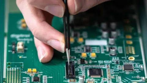 Getty Images A close-up of microchips on a circuit board.