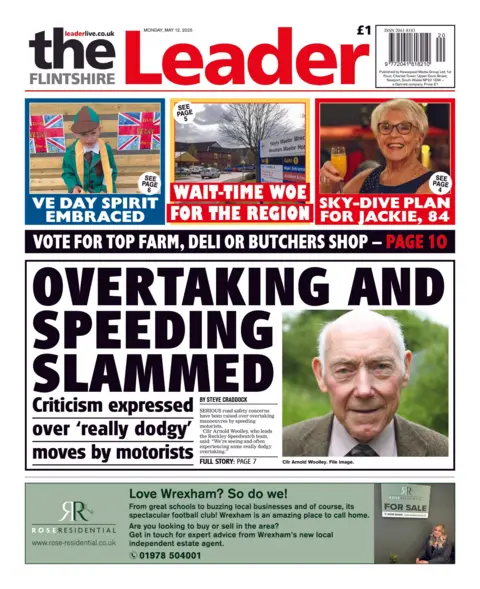 Flintshire Leader Front page of the Flintshire Leader newspaper with the splash headline "Overtaking and speeding slammed". At the bottom of the page is an advert for Rose Residential estate agent. At the top are three boxes with the following headlines: "VE day spirit embraced"; "Wait-time woe for the region"; and "Sky-dive plan for Jackie".