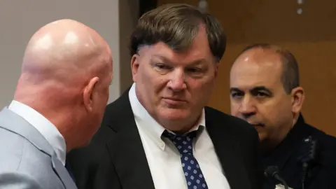 Rex Heuermann alongside attorney in court