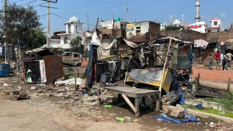 BBC Burnt carts seen in Sohna