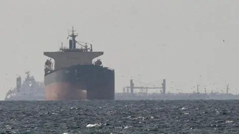 Reuters Ships travelling through the Strait of Hormuz.