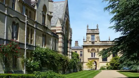 Mat Fascione Looking at Trinity College from the lawn.