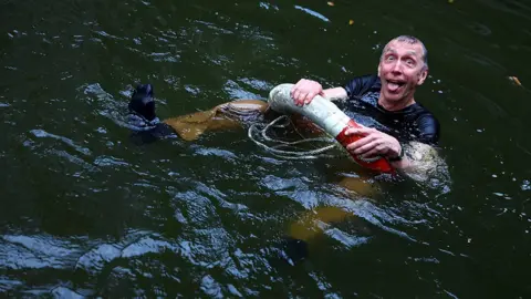 Lisi Niesner/Reuters Svante Paabo in water