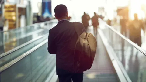 Getty Images Man travelling