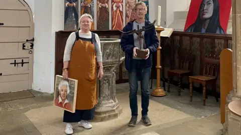 Friends of St Mary's Church Nick Cottam, right, with Claire Fried, the curator