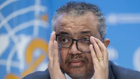 EPA WHO Director General Dr Tedros Adhanom Ghebreyesus reacts during a briefing in Geneva, Switzerland. Photo: 14 December 2022