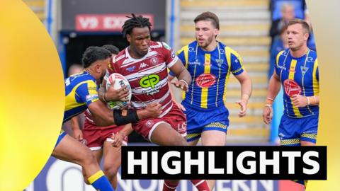 Wigan's Junior Nsemba is tackled against Warrington