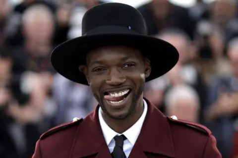 EPA Co-President of the jury Baloji attends the photocall for the 'Jury Camera d'Or' during the 77th annual Cannes Film Festival, in Cannes, France, 15 May 2024. The film festival runs from 14 to 25 May 2024.