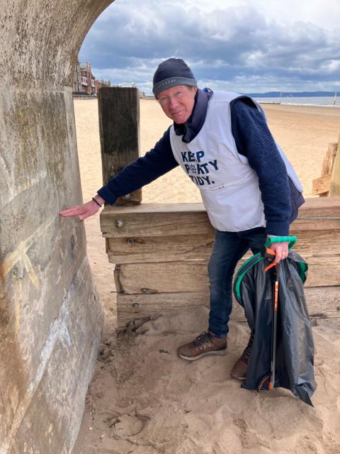 Colin Cornwall from Portobello shows where the sand level on the beach used to be